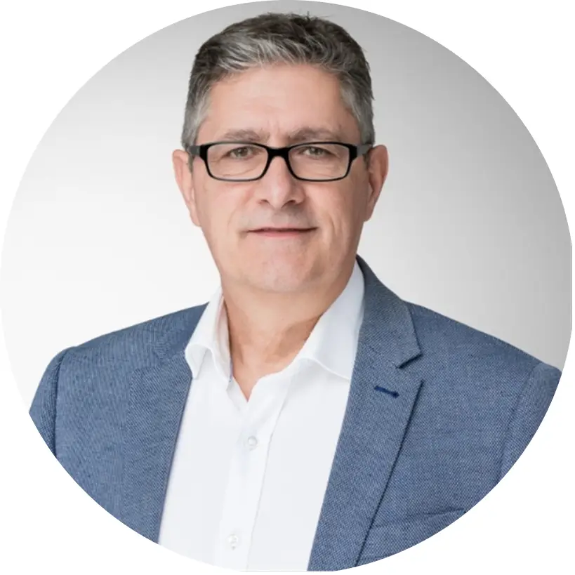 Brian Peters professional portrait – IQ Group senior executive in financial services consulting