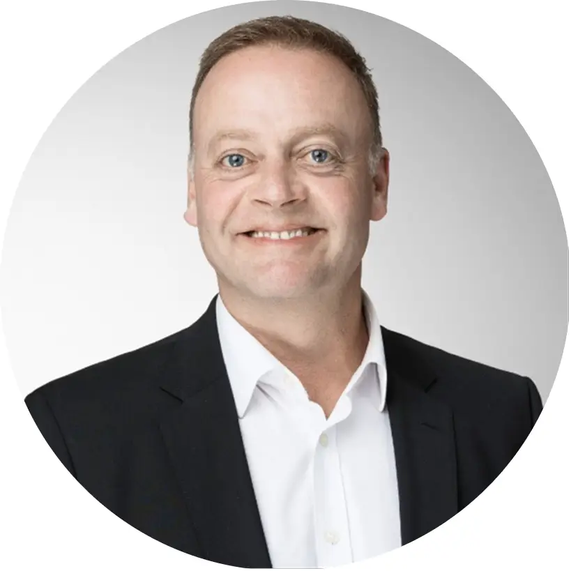 Mike Wilcox professional portrait – IQ Group senior executive with deep financial services expertise